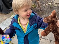 August checking out Liam's stuffies