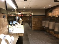 The lodge is the same building that it was when Greg came as a kid, but it has certainly been renovated. Look at this very un-Eastern men's room!