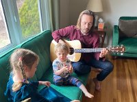 Maybe August is telling Val a story?