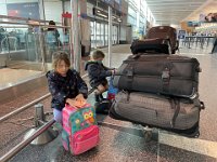 With gear - Skiing requires a LOT of gear