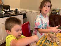 Back in the dining room they could unwrap.