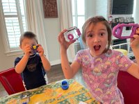 Back at the house, there was a box waiting with a new camera for Val!