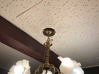 Lighting fixtures salvaged from some other structure